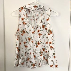 Orange and white floral blouse